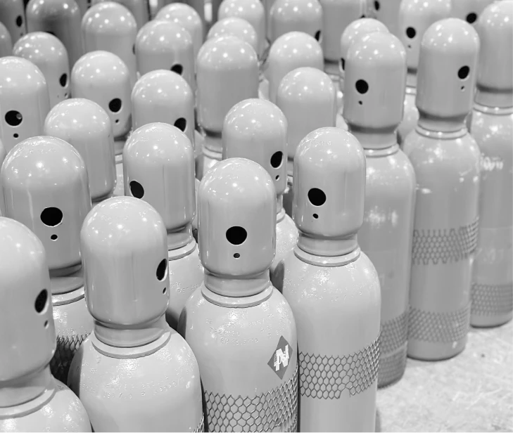 Gas cylinders with protective valve covers